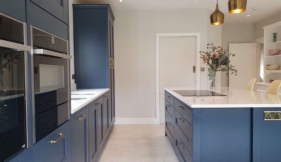 Blue shaker kitchen with island in Cardiff