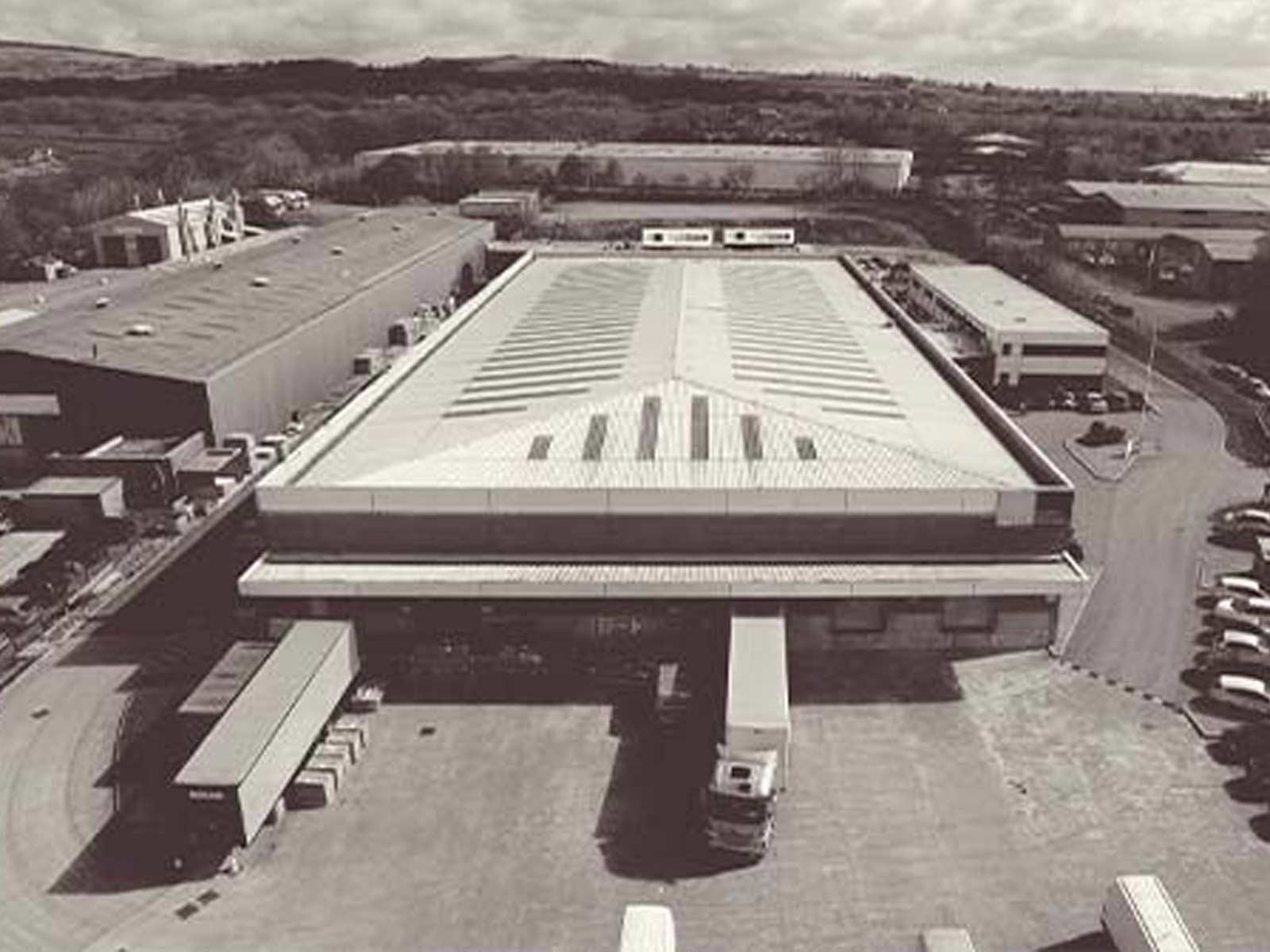A birds-eye view of the Sigma 3 plant with delivery bays and carpark