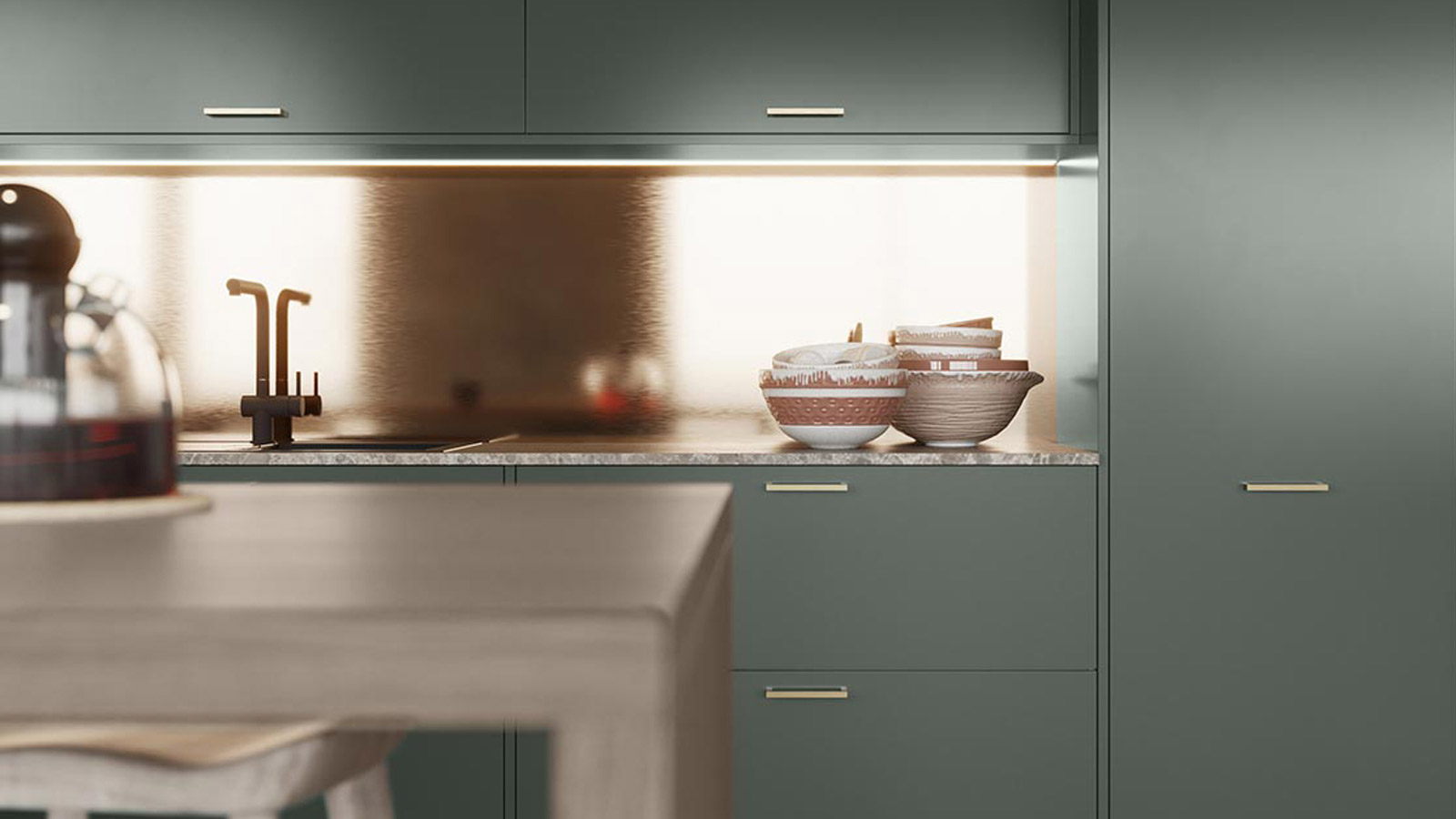 Glossy green kitchen cabinets with brass t-bar handles and a metallic backsplash