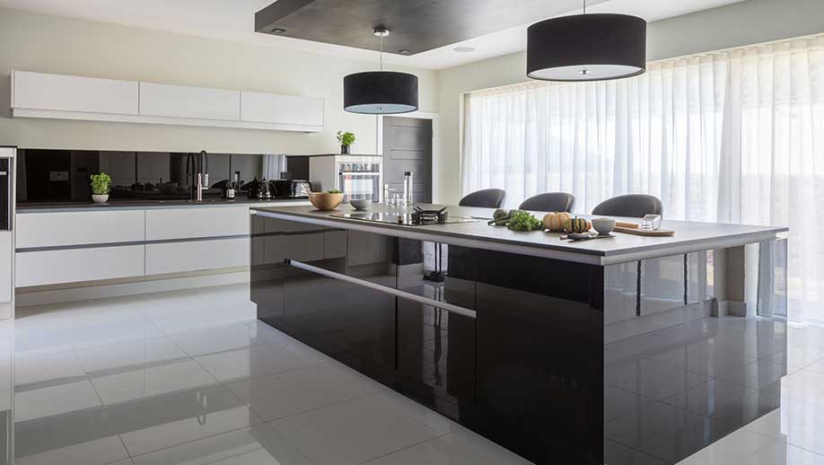 Kitchen island in a modern gloss kitchen