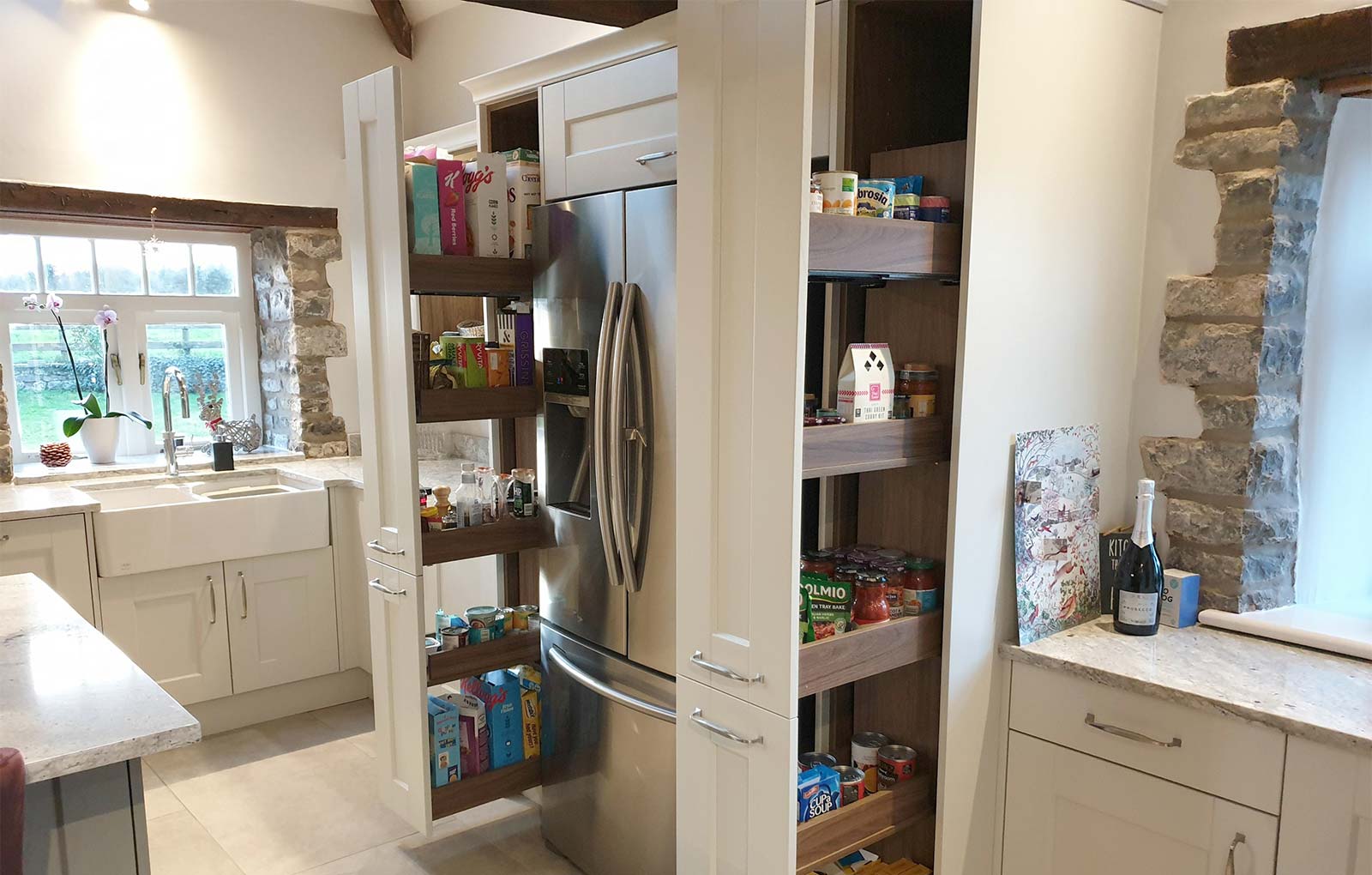 Pull out storage in a grey shaker kitchen