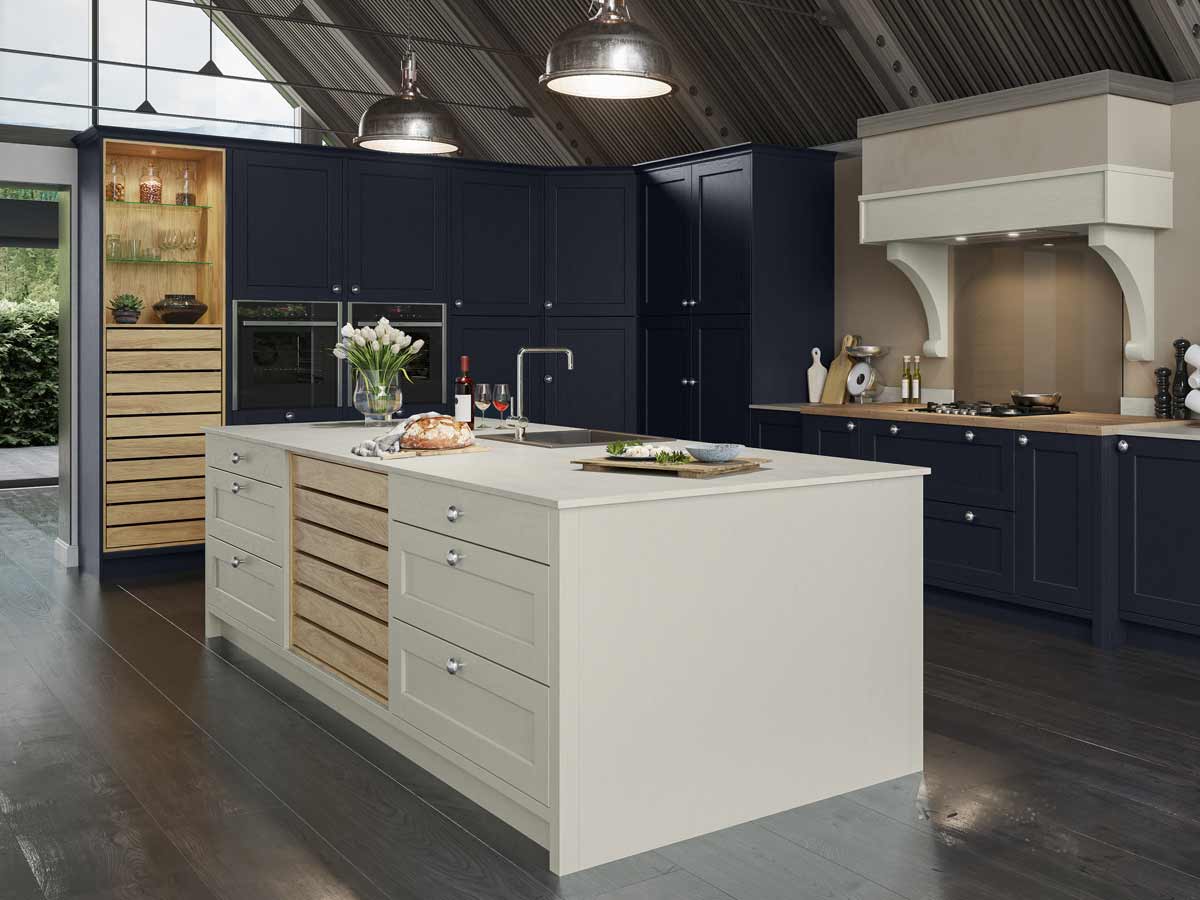 Large midnight blue and cream kitchen in barn conversion