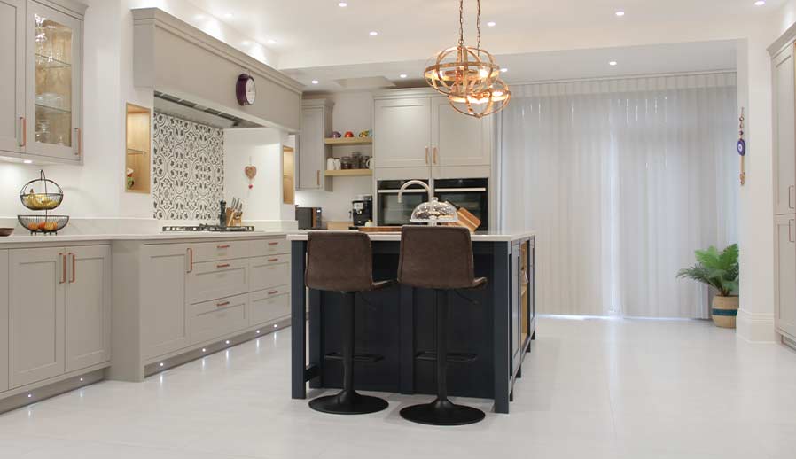 Shaker kitchen with kitchen island and media unit in Cardiff