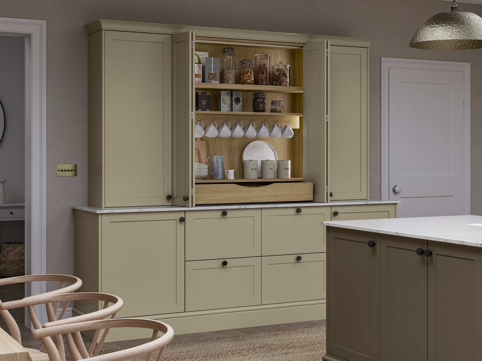 A tea station cum breakfast cupboard in a oak wood finish