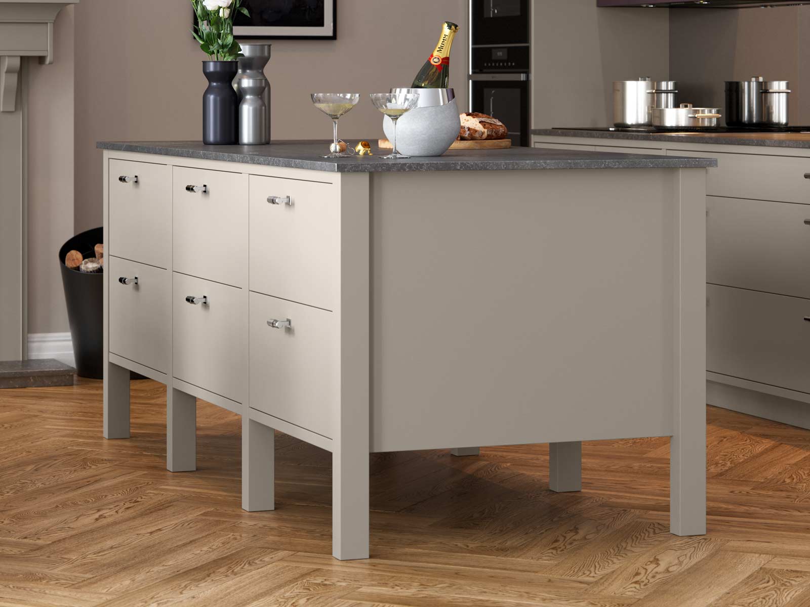 A mobile kitchen island with a dark stone worktop