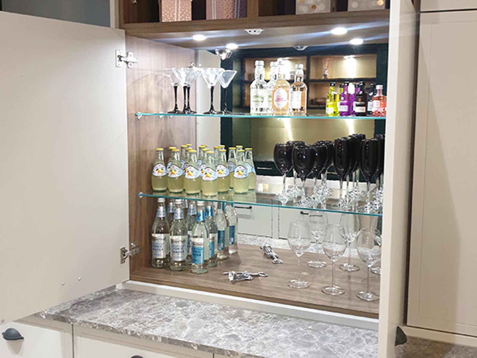 Drinks cabinet with mirrored back and glass shelves