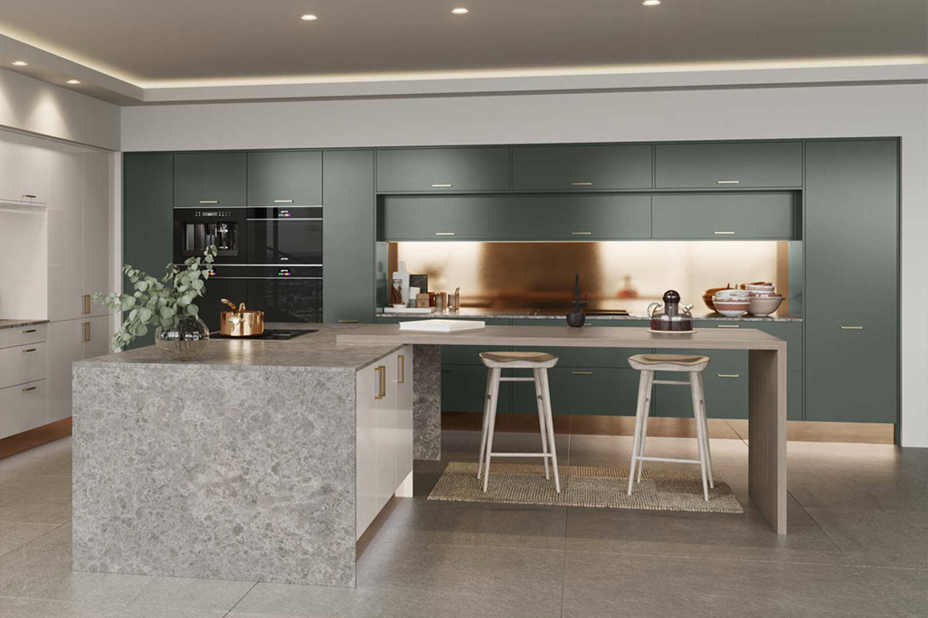A modern green kitchen with a granite kitchen island and bar stools