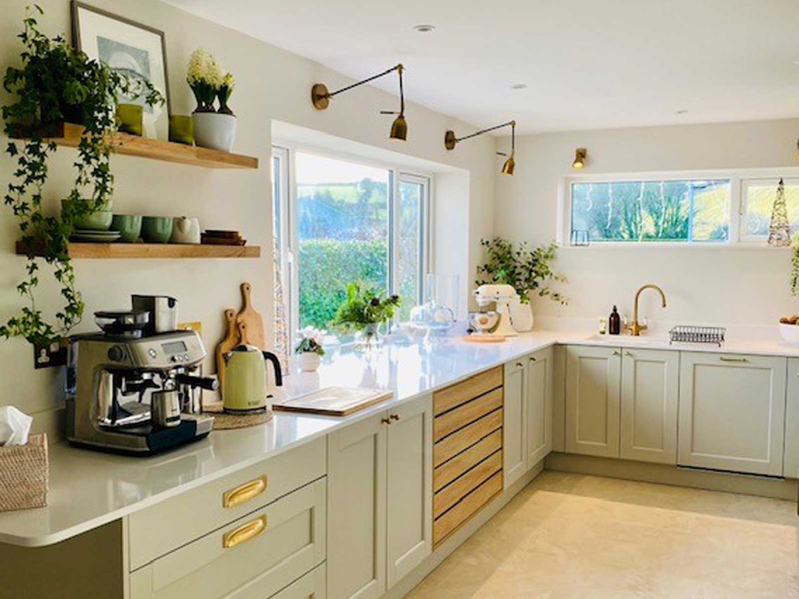 A natural kitchen with natural stone surfaces and a biophilic design