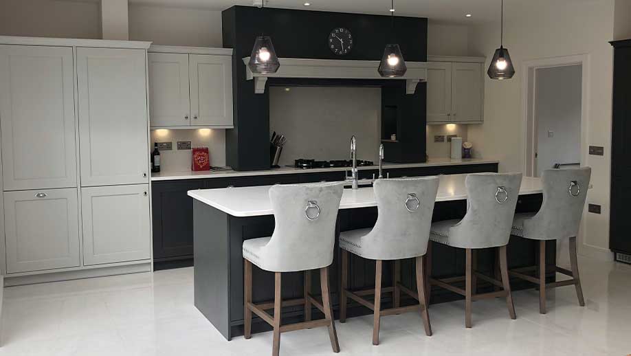 Beautiful classic kitchen in dark grey with kitchen island