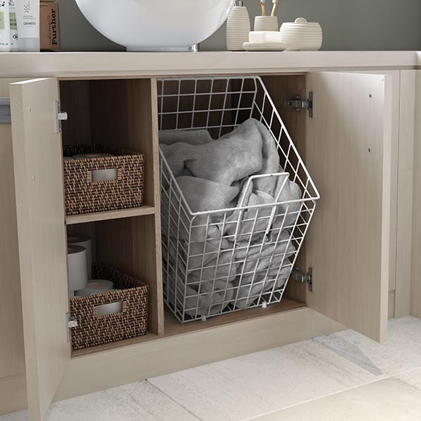 Tilting linen basket