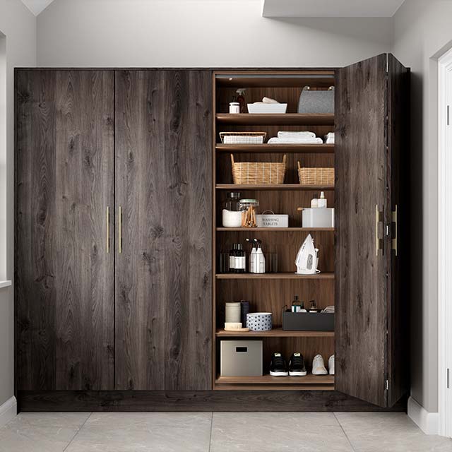 Bi-fold kitchen cabinet doors on a tall cabinet