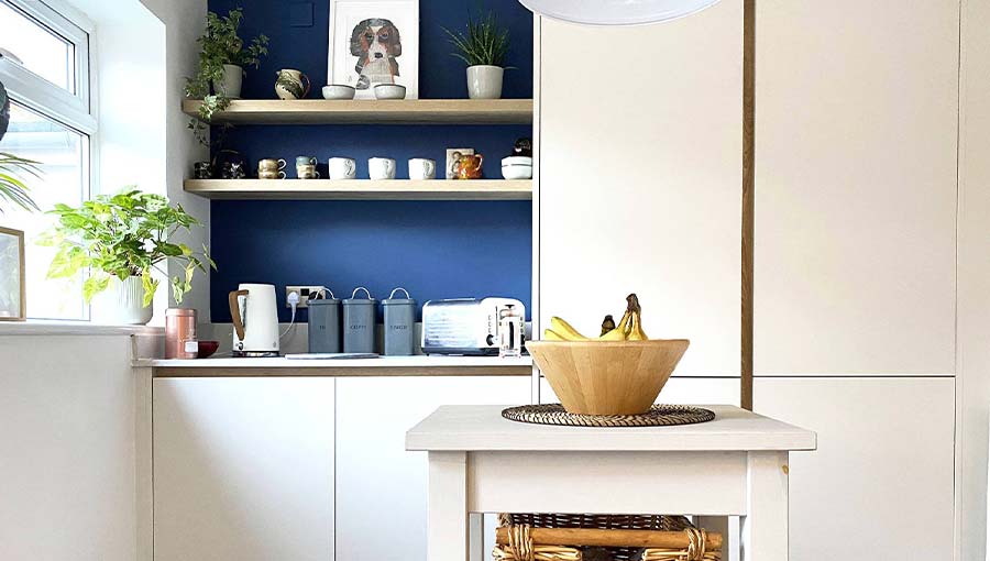 Feature wall with open shelving in a modern kitchen