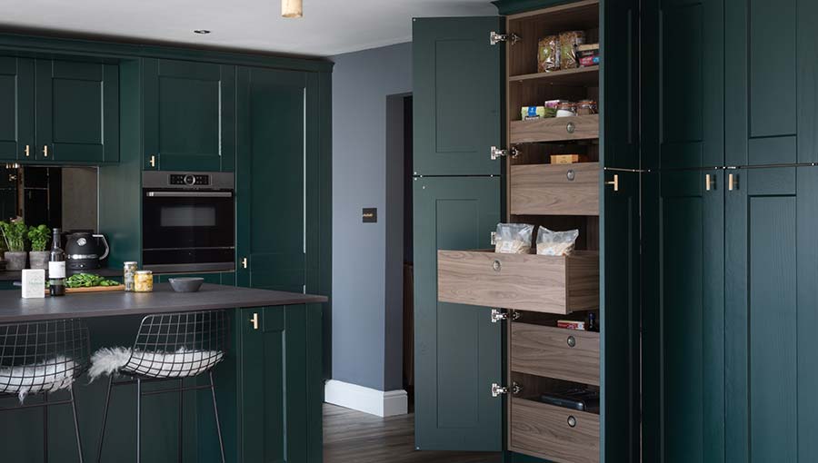 Kitchen larder unit storage feature in a shaker kitchen