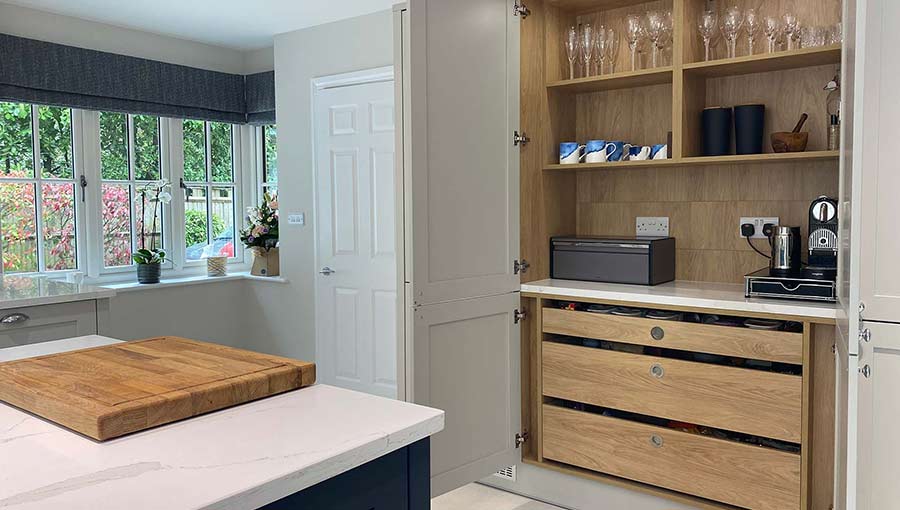 Multifunctional drinks cabinet in a shaker kitchen