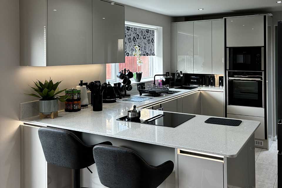 Gloss Handleless Kitchen by Sigma 3 Kitchens