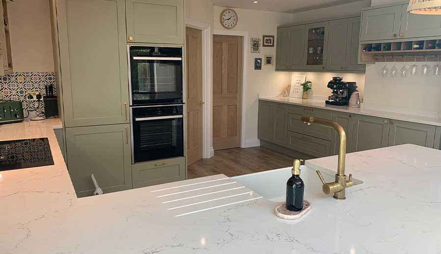 Shaker kitchen in green by Sigma 3 Kitchens in Esher