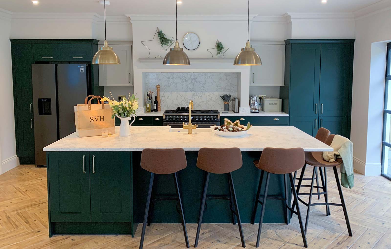 Green shaker kitchen with kitchen island