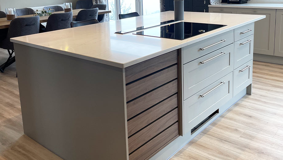 Grey kitchen island with crate drawers