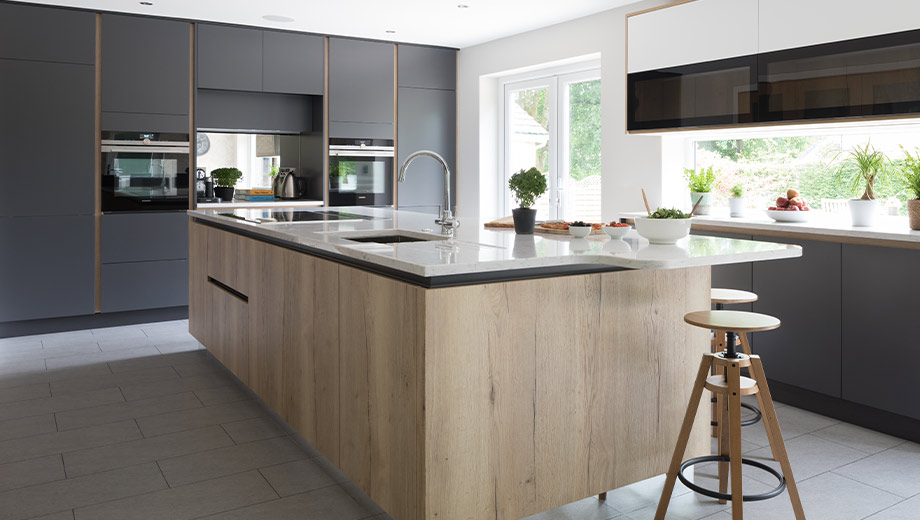 Dark grey kitchen with warming wood accents