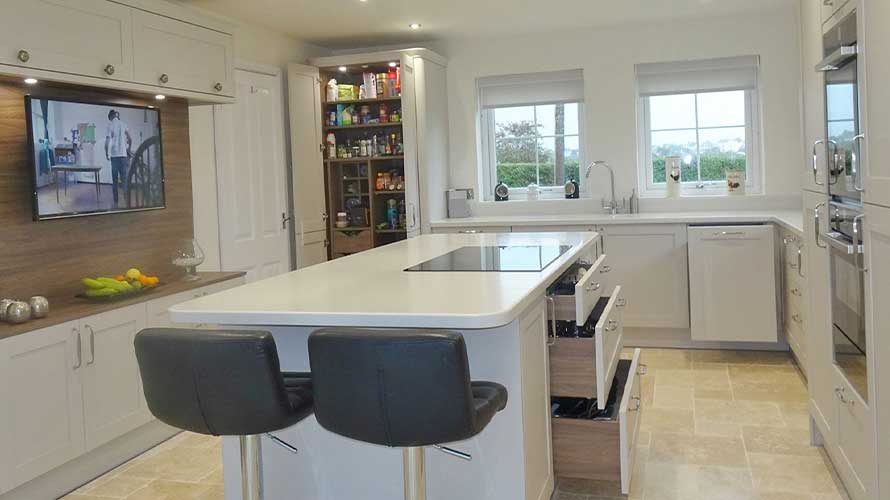 Kitchen storage with wood interiors in a grey shaker kitchen