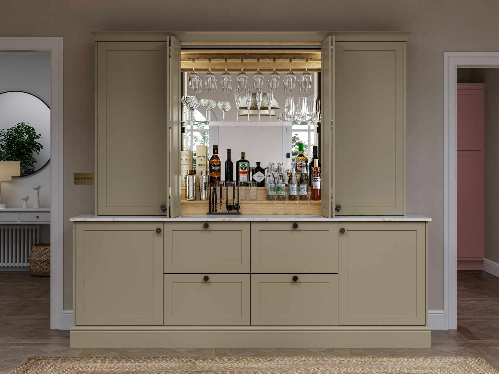 A Sigma 3 Bar Dresser encased in a pale green kitchen range doors