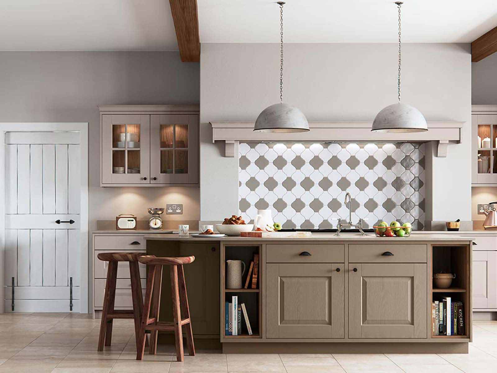 Pale green Carnegie kitchen range with tiled backsplash and industrial lighting