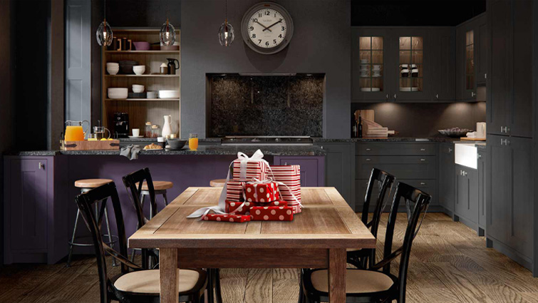 Classic Ashbourne Mulberry kitchen with slate grey cabinets and walnut shelves