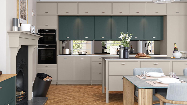 A bright, colourful kitchen with green painted cupboard doors