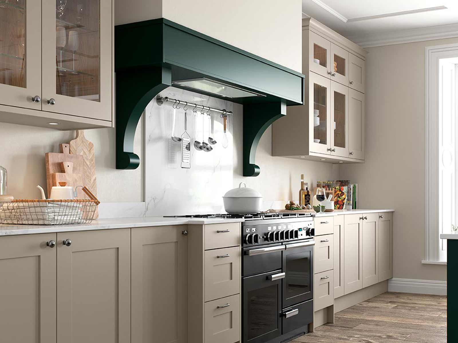 Cream shaker kitchen with splashback and pine green cooker hood