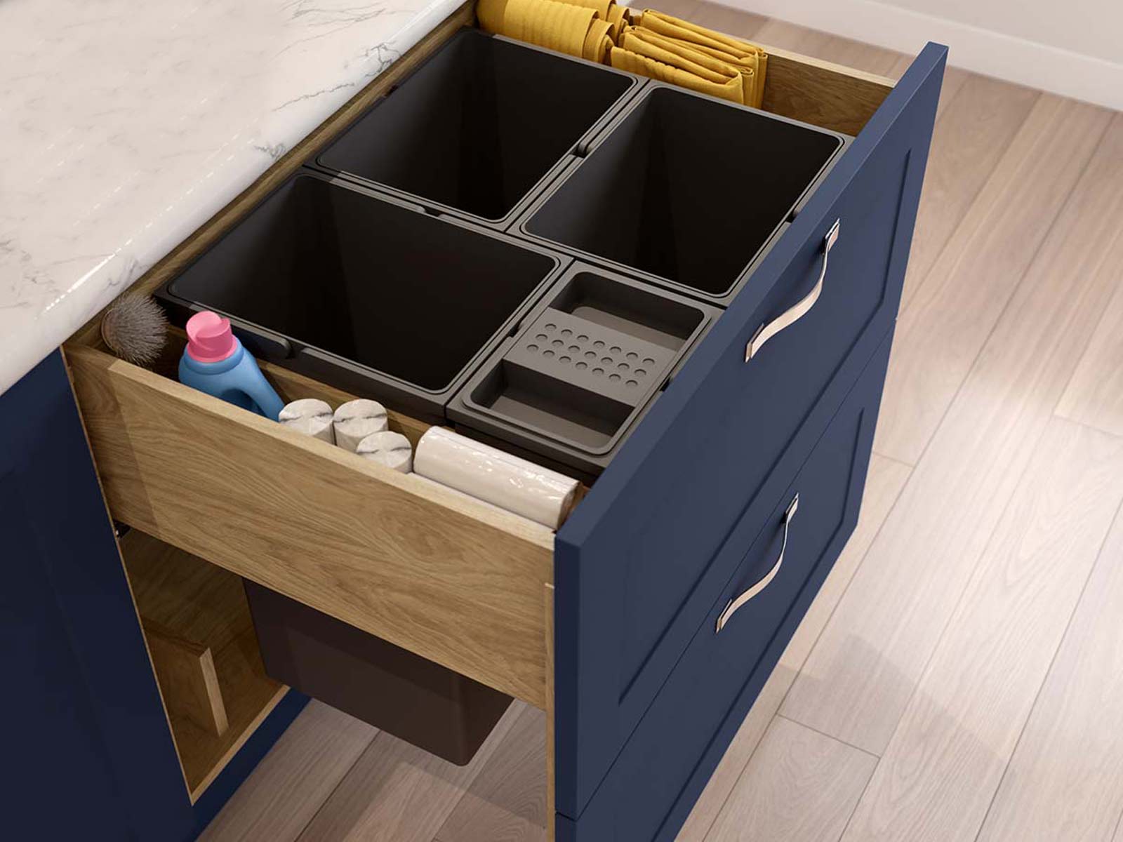 A navy bin with two compartments for recycling and two for kitchen waste
