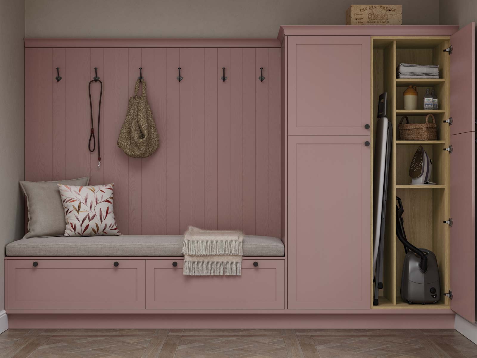 Boot room seat in pink and utility cupboard and hanging ironing board
