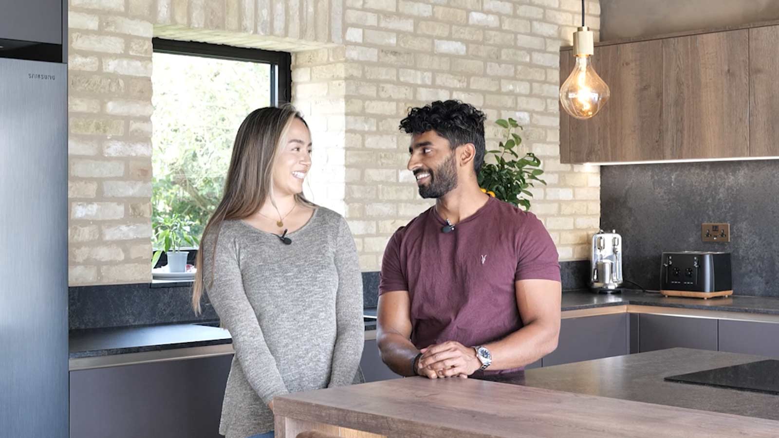 Zara and Guiliano Rapoz at their kitchen island