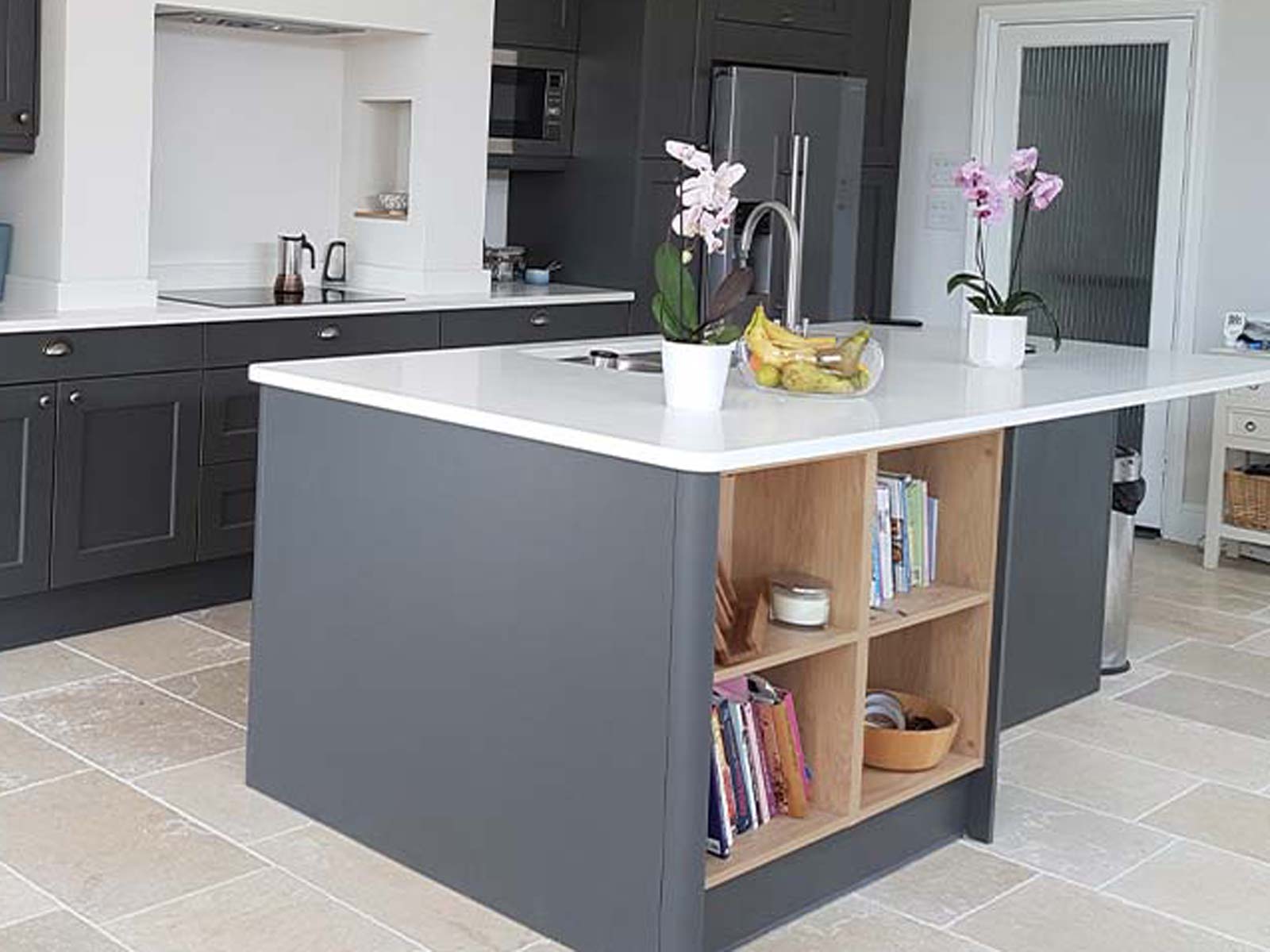 Kitchen island with open shelving design feature