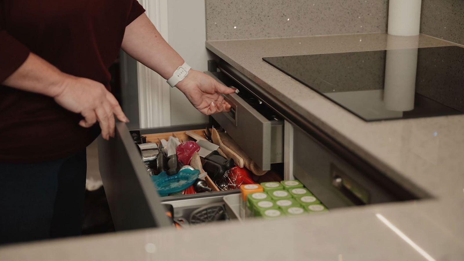 An ideal-for-Instagram kitchen corner showing peninsula kitchen design storage