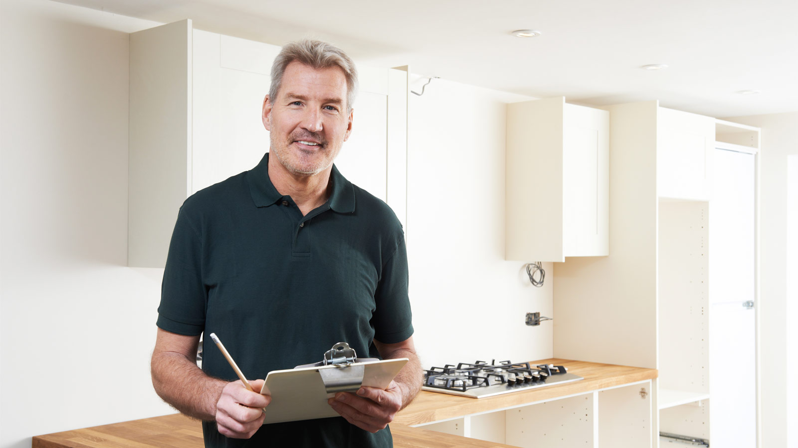 The kitchen fitter’s installation manager for Sigma 3 Kitchens Swansea