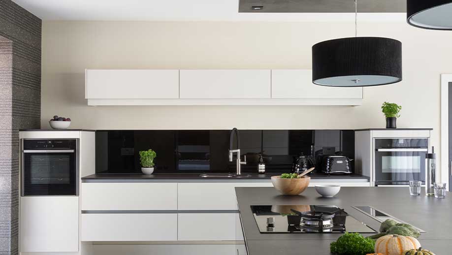 Floating cabinets in a modern gloss kitchen