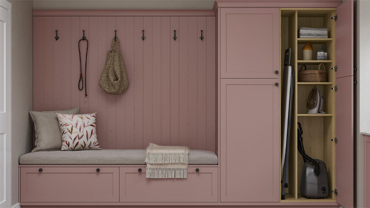 A utility room cabinet with a utility room cupboard divider and a boot room seat