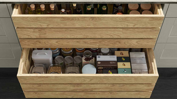 Light wood timbre crate drawers with a grained finish filled with pantry supplies