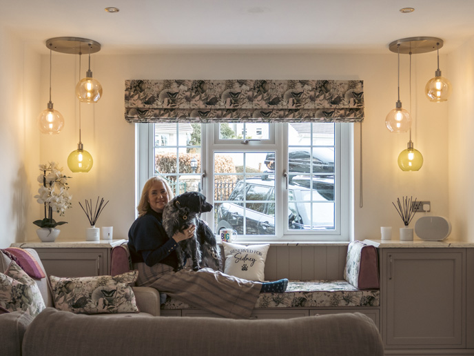 Adele and her dog Sidney on integrated seating