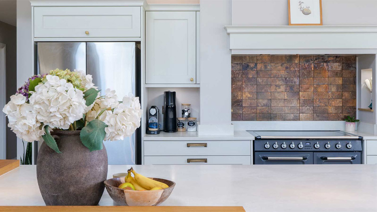 A classic Shaker-style barn conversion kitchen with a kitchen island