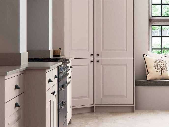 A classic kitchen featuring a corner pantry cupboard with light doors