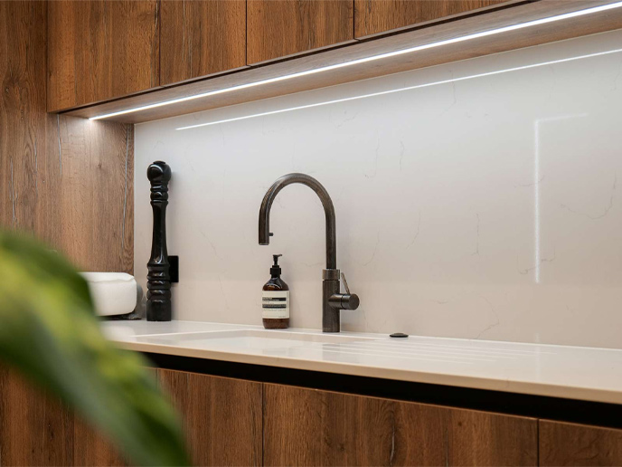 Charlie Brooks’ kitchen units and worktops, featuring Nordic interior design
