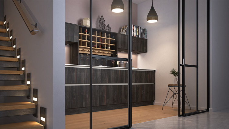 A grey and dark wood kitchen with sleek driftwood cabinet doors