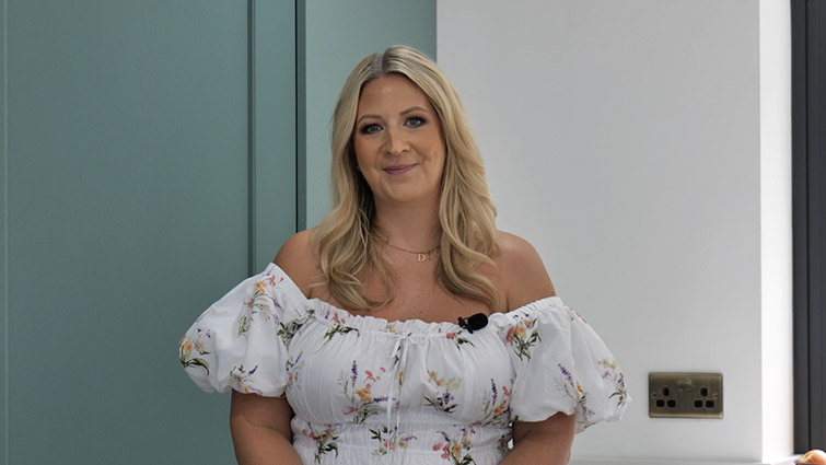 Beth reviewing her kitchen extension layout in her extended kitchen