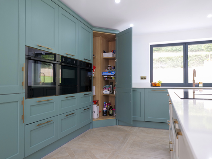 A kitchen extension containing a large kitchen corner pantry