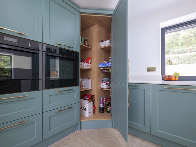 A kitchen extension with a kitchen corner pantry closeup