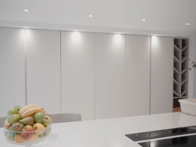 A hidden home bar with a secret drinks cabinet built into a childproof kitchen