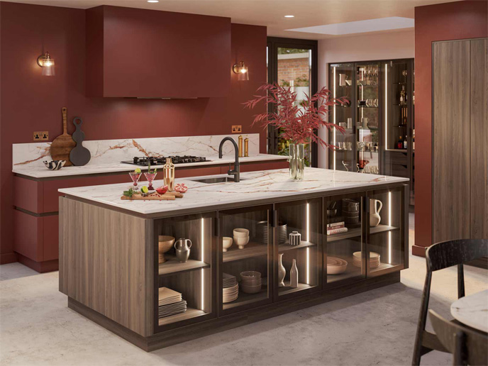 A high-end modern kitchen with burgundy doors and rich wood