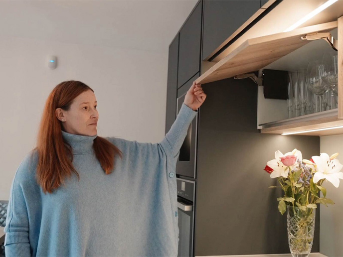 Kitchen wall cabinets with soft-close doors and task lighting