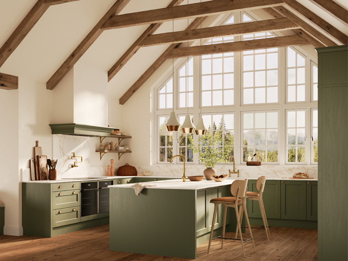A modern Mediterranean kitchen with dark green cupboards